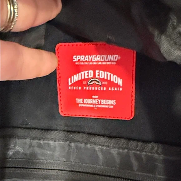 Sprayground Black and White Shark Backpack with Red Accents - Picture 5 of 7